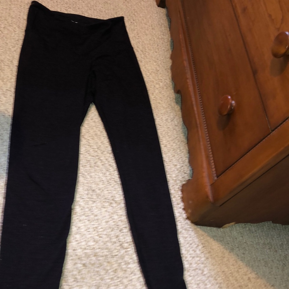 Purple and black striped leggings